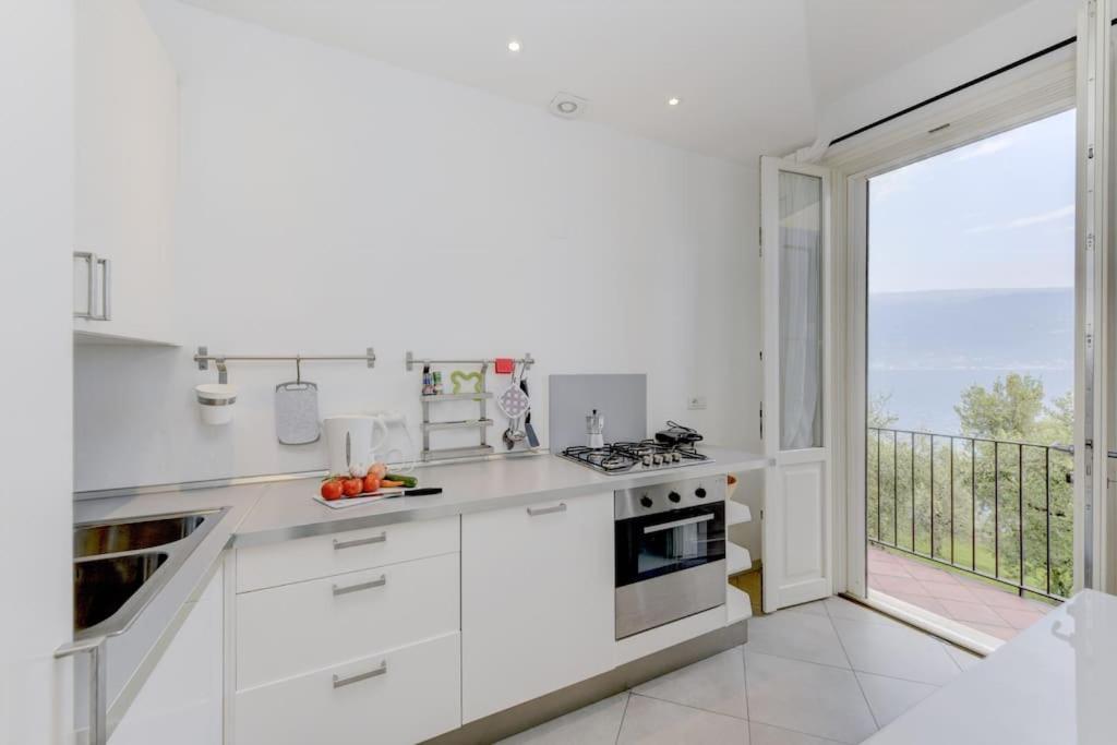 Oleandro Apartment Directly On The Lake ガルニャーノ エクステリア 写真